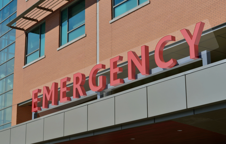 Emergency room entrance sign outside hospital